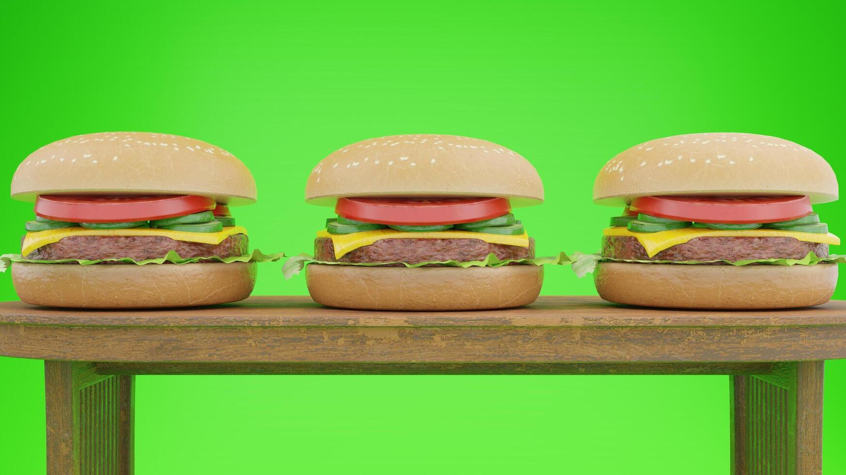 Three hamburgers on a wooden table with a green background photo