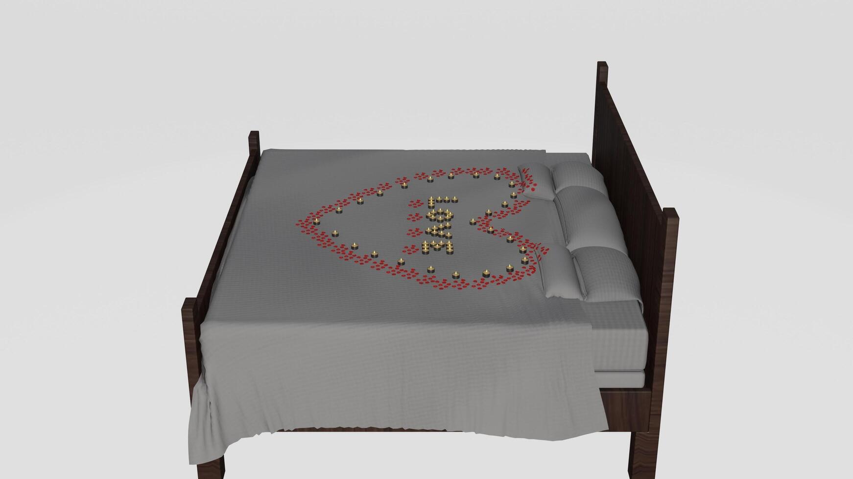 A bed with a heart on it and a pillow photo