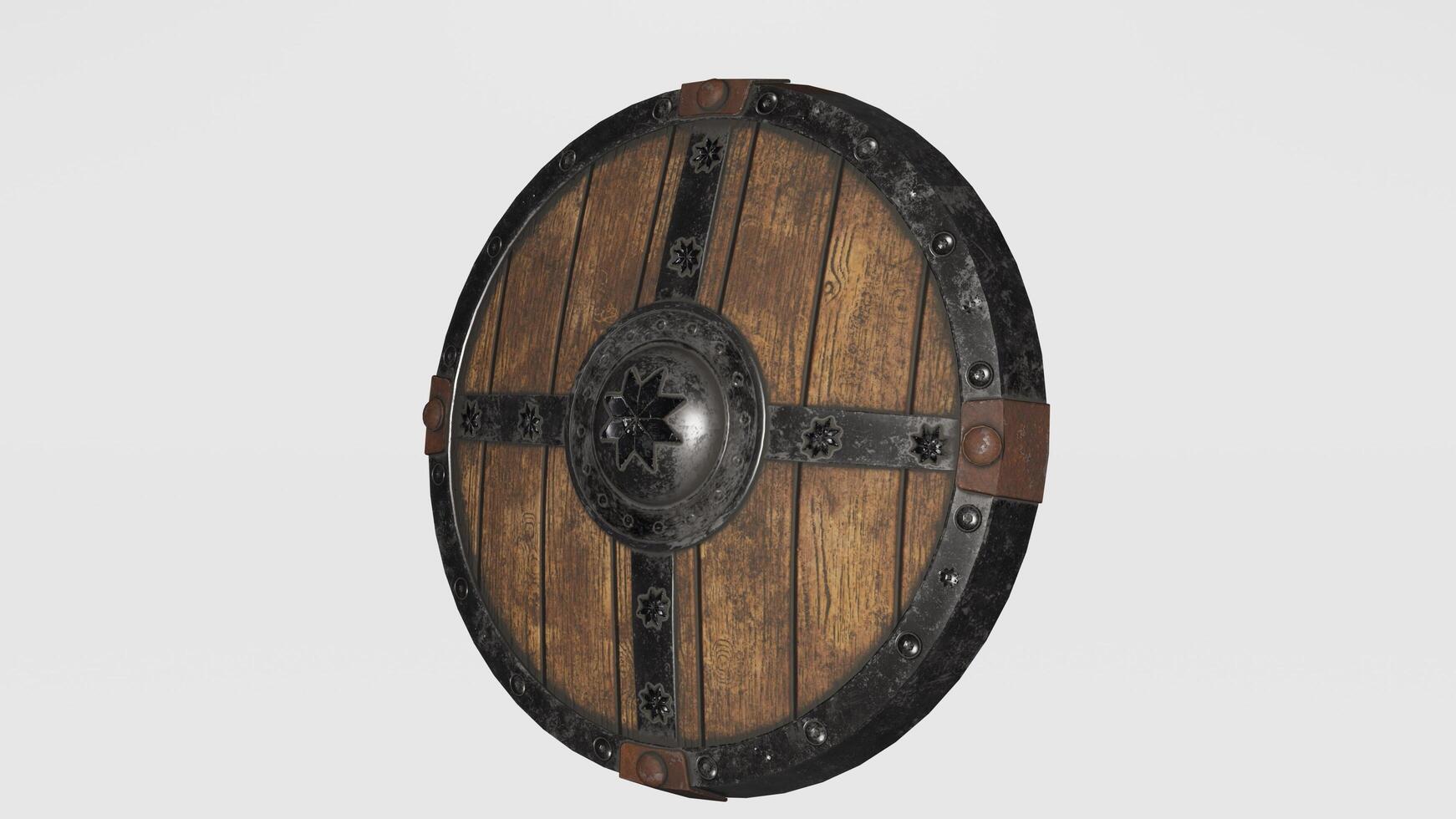 A wooden shield with metal and leather on it photo