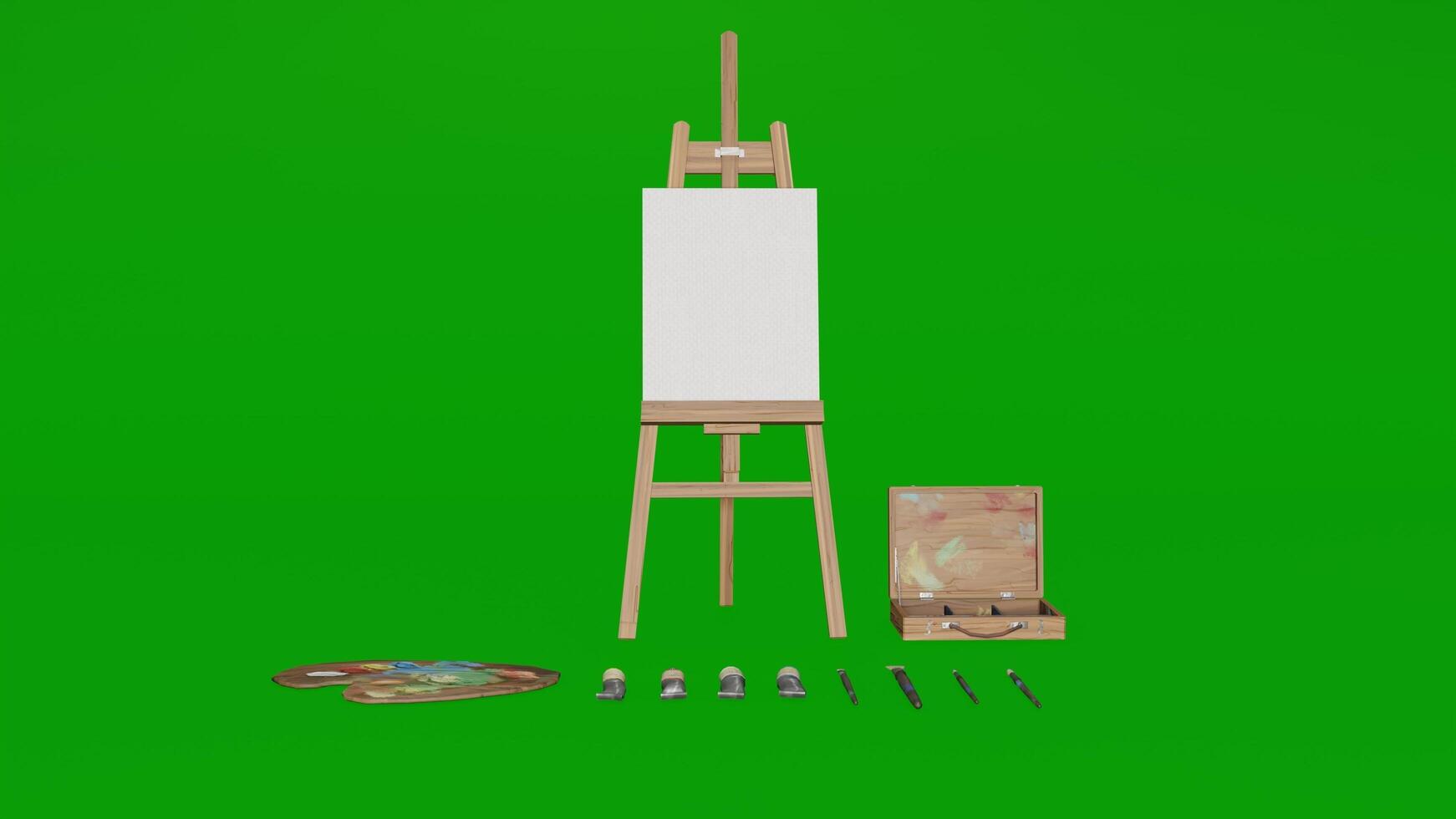 A green screen with a easel, paintbrush and other items photo