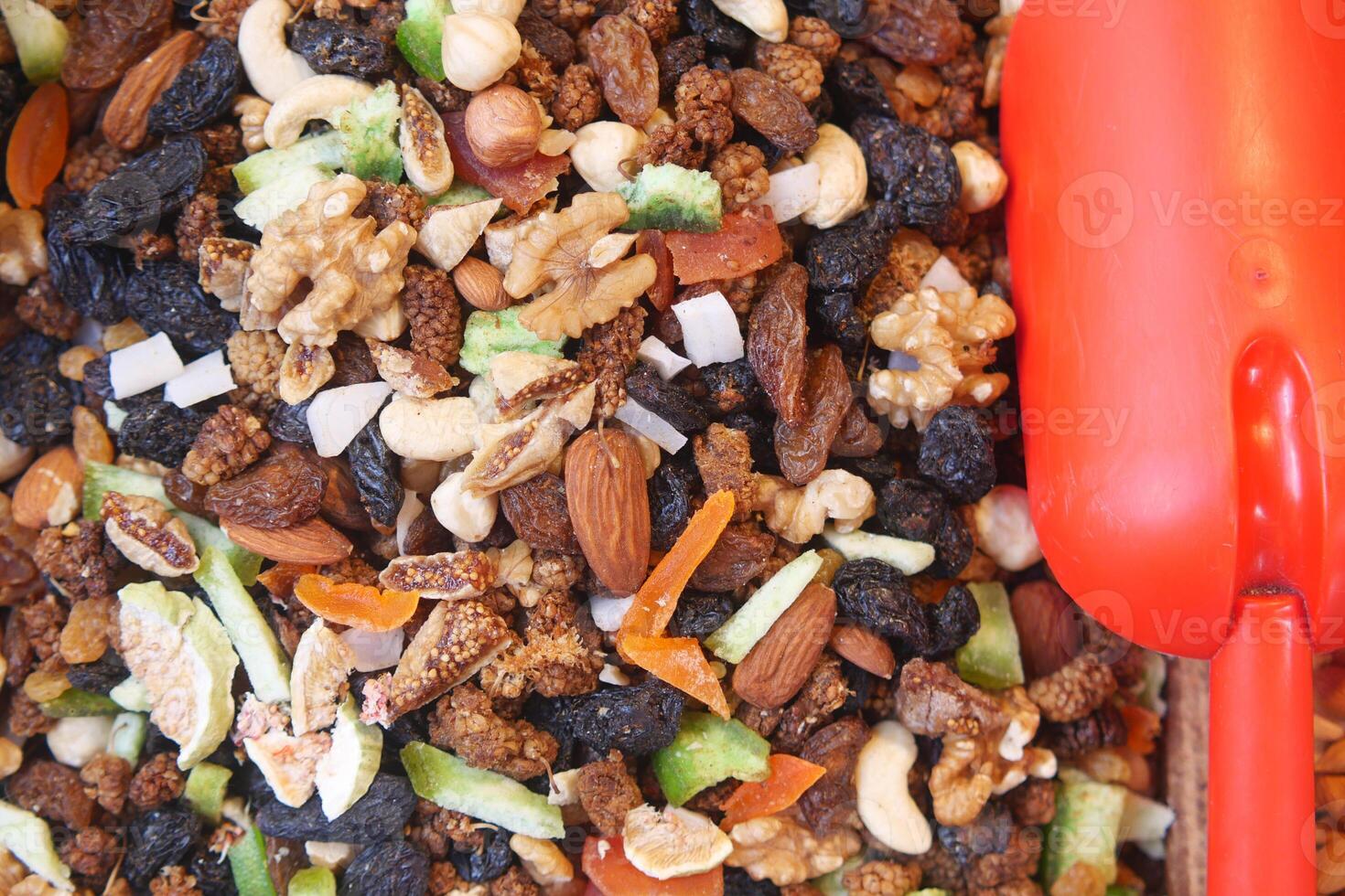 A Delightful Nut Mix, Including Dried Fruits and Seeds, Perfect for Enjoying Healthy Snacking photo