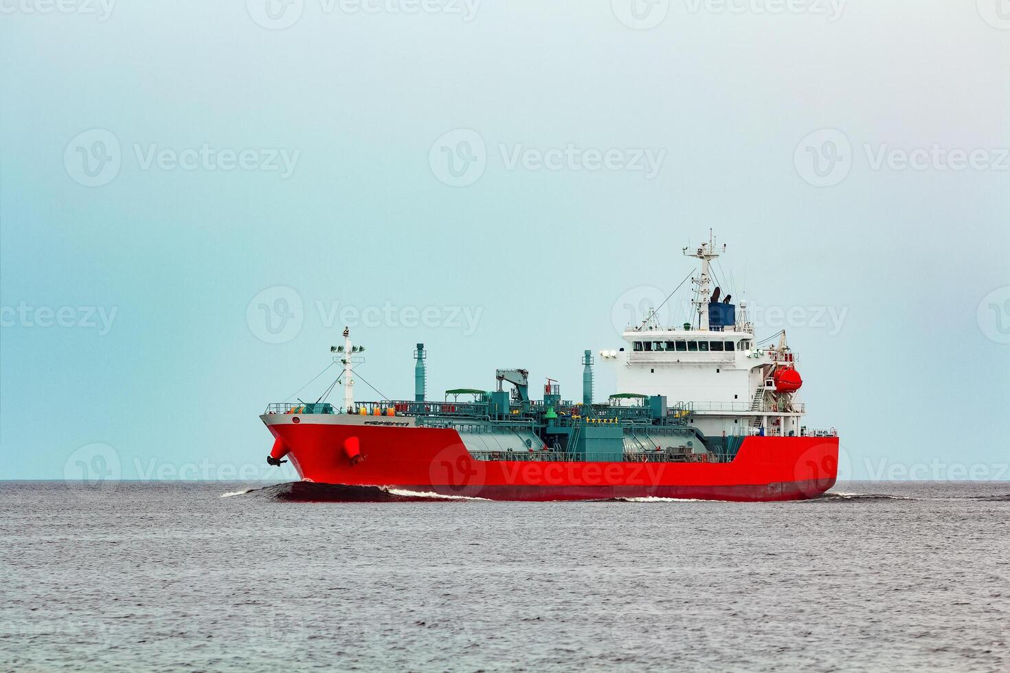 Red tanker. Toxic substances and petroleum products transfer photo