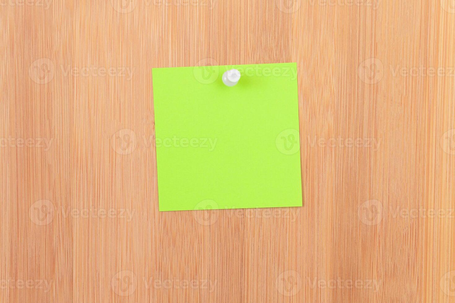 Green Sticky Note Pinned to the Wooden Message Board. To Do List Reminder in Office. Blank Memo Sticker at Work - Template. Empty Checklist - Mockup photo