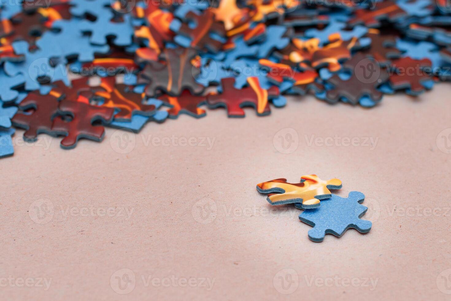 Mixed Pieces of a Colorful Jigsaw Puzzle - Strategy and Solving Problem Concept photo