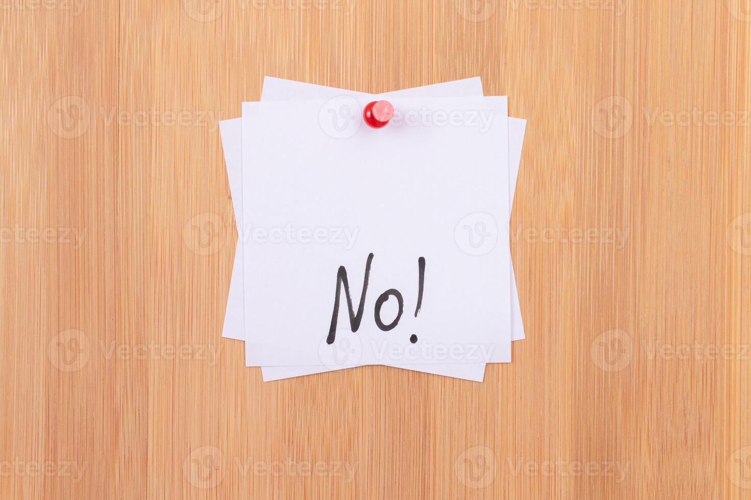 NO - White Sticky Notes with Written Word NO, Pinned to the Wooden Message Board. To Do List Reminder in the Office. Memo Note at Work photo
