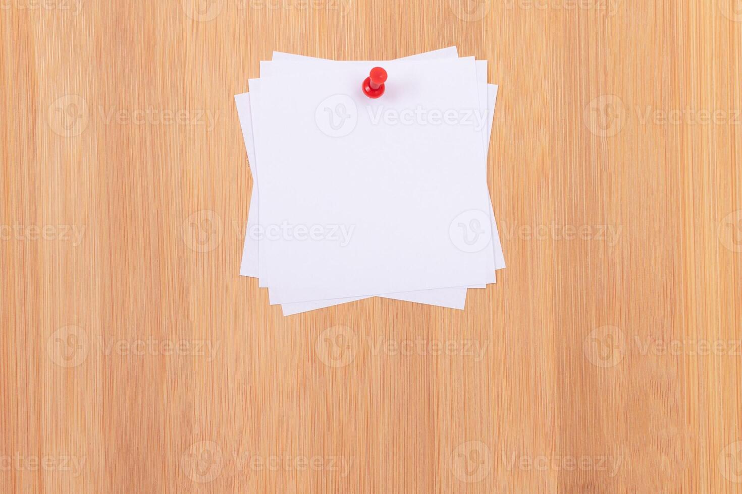 White Sticky Notes with Copyspace Pinned to the Wooden Message Board. To Do List Reminder in Office. Blank Memo Stickers at Work - Template. Empty Checklist - Mockup photo