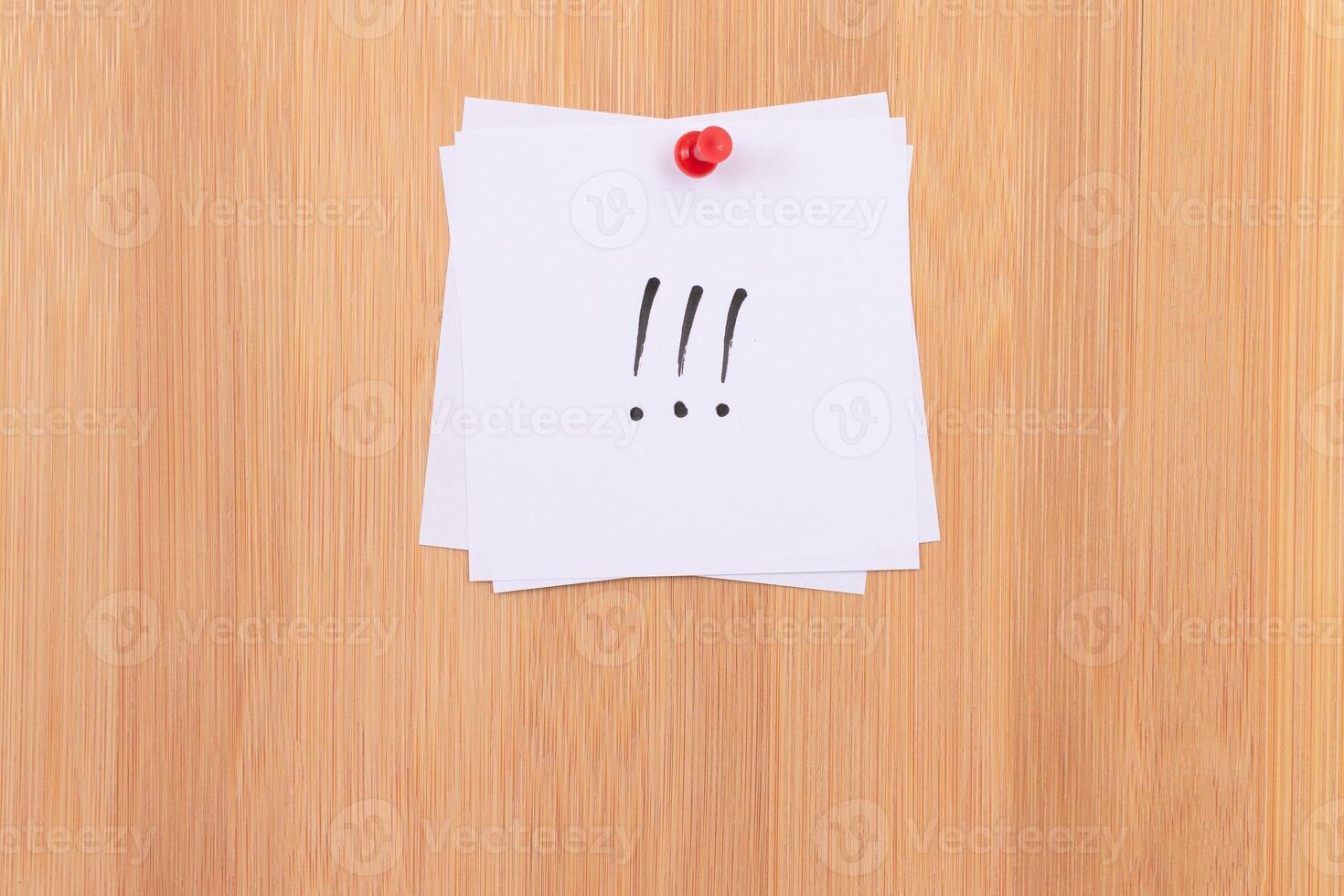 White Sticky Notes with Three Exclamation Points Pinned to the Wooden Message Board. To Do List Reminder in the Office. Memo Note at Work photo