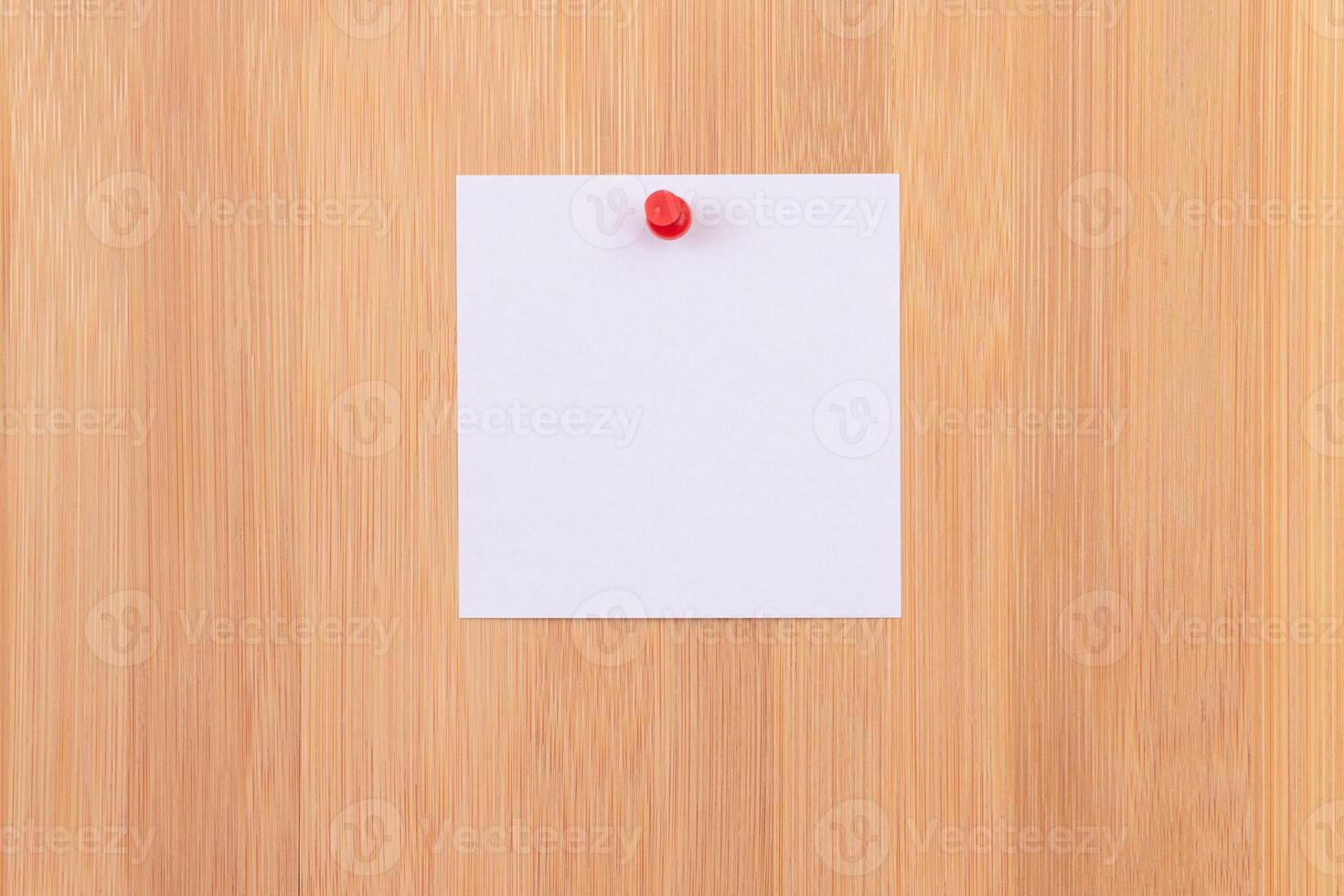 White Sticky Note with Copyspace Pinned to the Wooden Message Board. To Do List Reminder in Office. Blank Memo Sticker at Work - Template. Empty Checklist - Mockup photo
