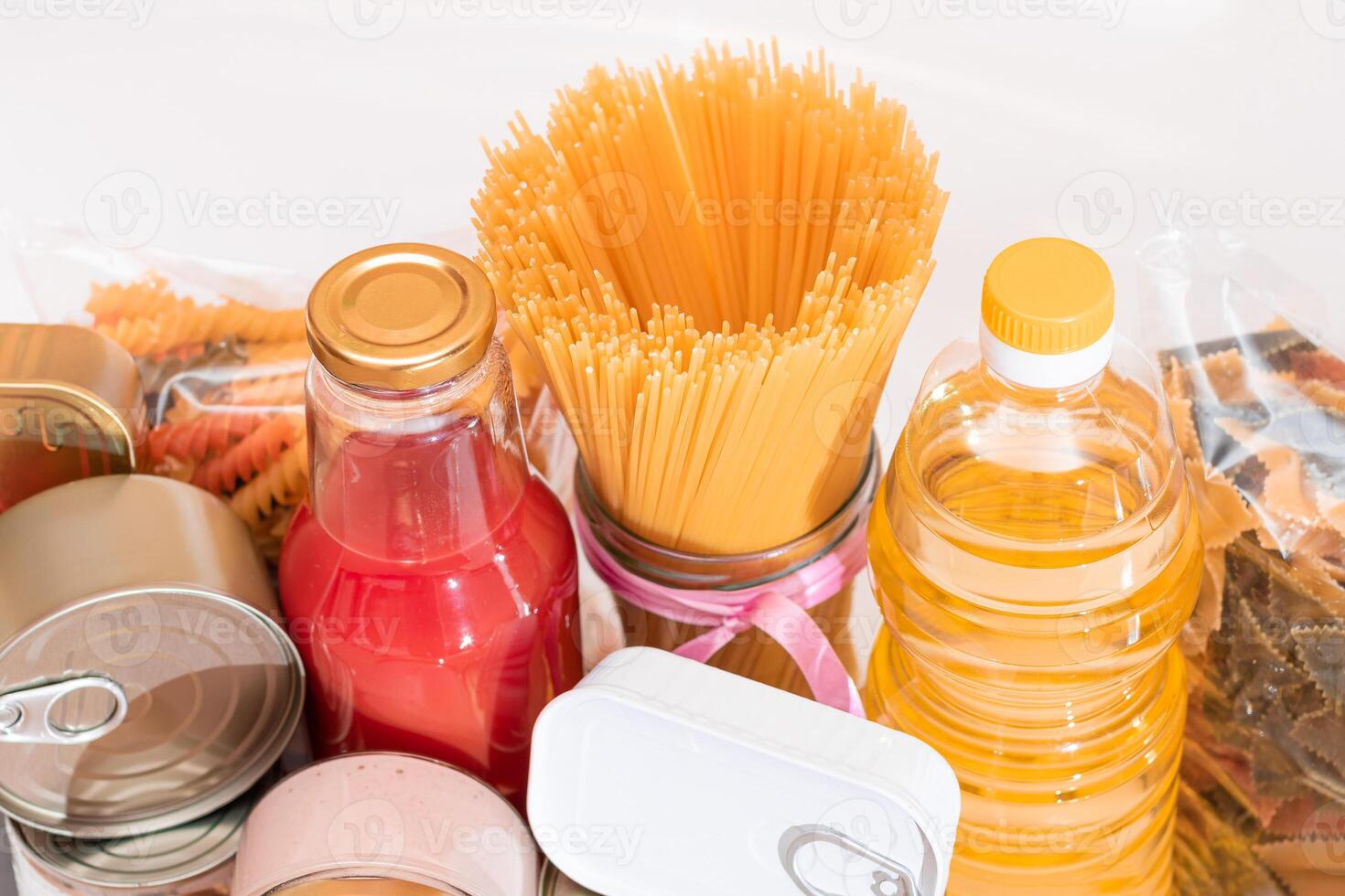 Food Reserves. Canned Food, Spaghetti, Tomato Juice, Pasta and Grocery. Emergency Food Storage in Case of Crisis. Strategic Food Supplies photo