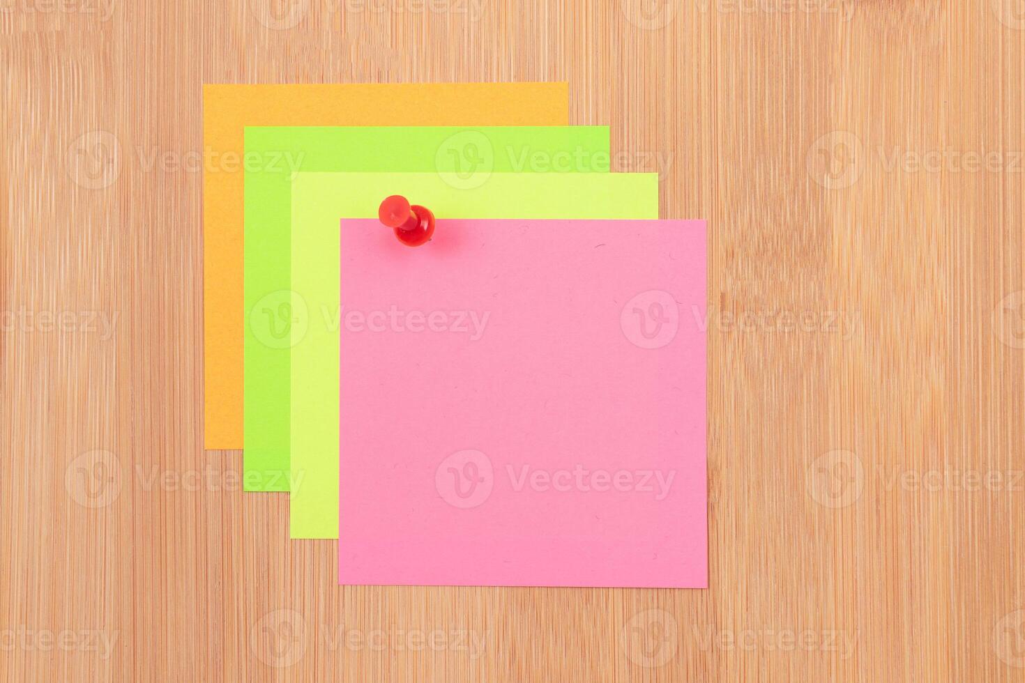 Colored Sticky Notes with Copyspace Pinned to the Wooden Message Board. To Do List Reminder in Office. Blank Memo Sticker at Work - Template. Empty Checklist - Mockup photo