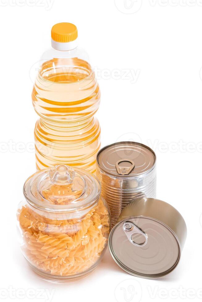 Food Reserves. Canned Food, Spaghetti, Pate, Tuna, Tomato Juice, Pasta, Fish and Grocery - Isolated on White Background. Emergency Food Storage in Case of Crisis. Strategic Food Supplies - Isolation photo