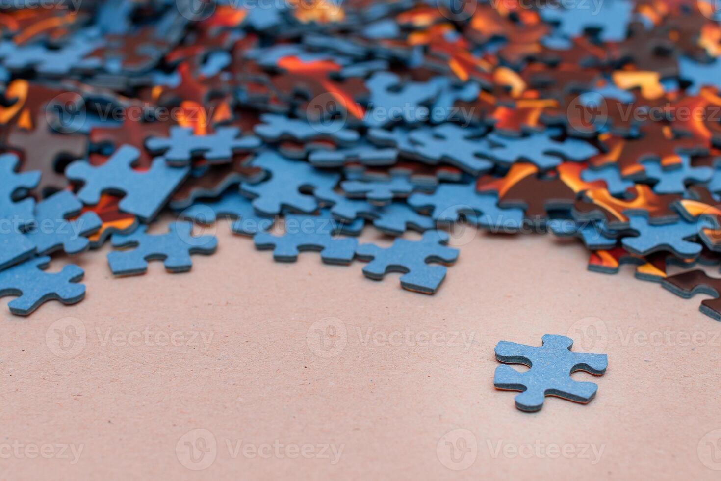 Mixed Pieces of a Colorful Jigsaw Puzzle - Strategy and Solving Problem Concept photo