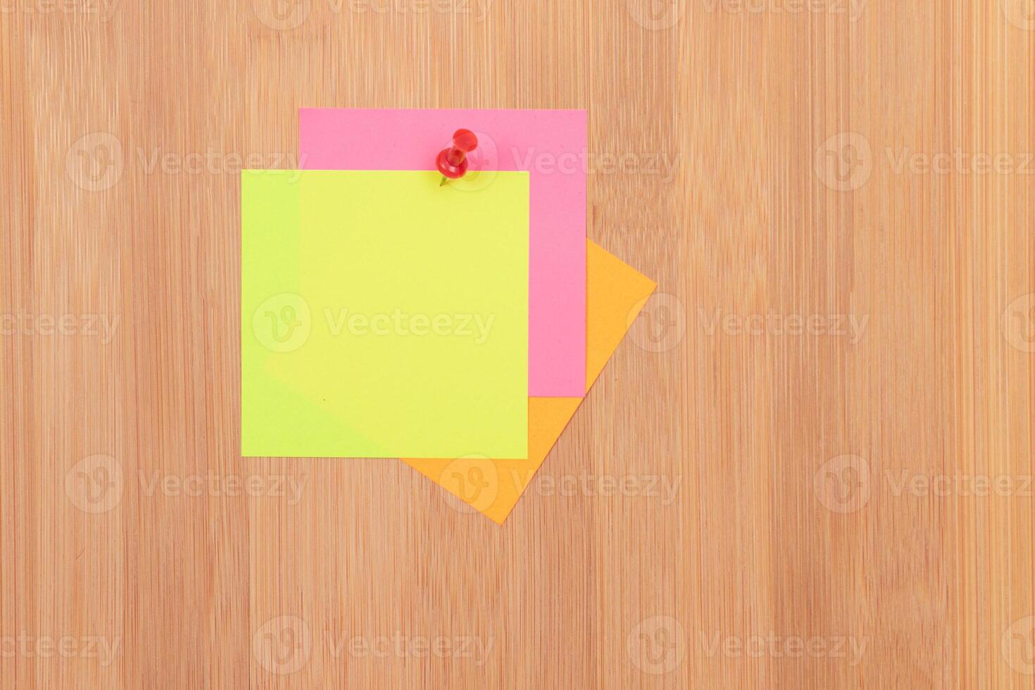 Colored Sticky Notes with Copyspace Pinned to the Wooden Message Board. To Do List Reminder in Office. Blank Memo Sticker at Work - Template. Empty Checklist - Mockup photo