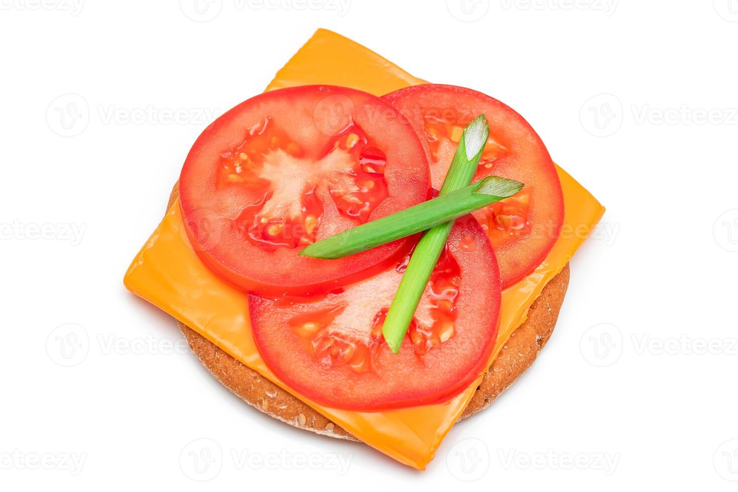 Crispy Cracker Sandwich with Tomato, Cheese and Green Onions - Isolated on White. Easy Breakfast. Quick and Healthy Sandwiches. Crispbread with Tasty Filling. Healthy Dietary Snack - Isolation photo