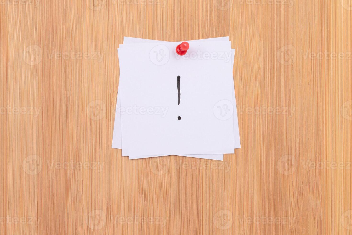 White Sticky Notes with Exclamation Point Pinned to the Wooden Message Board. To Do List Reminder in the Office. Memo Note at Work photo