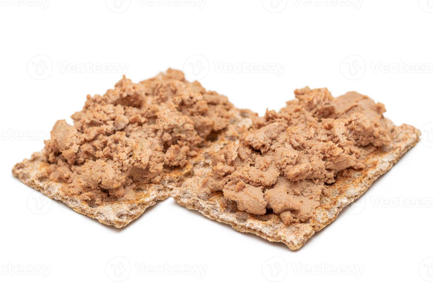 Crispy Sandwich with Chicken Pate Isolated on White Background. Whole Grain Bread with Liver Pate. Diet Breakfast and Healthy Food photo