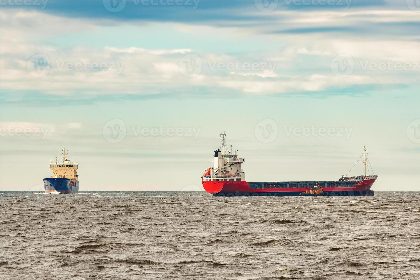 Red new cargo ship moving abroad. Product export in Europe photo