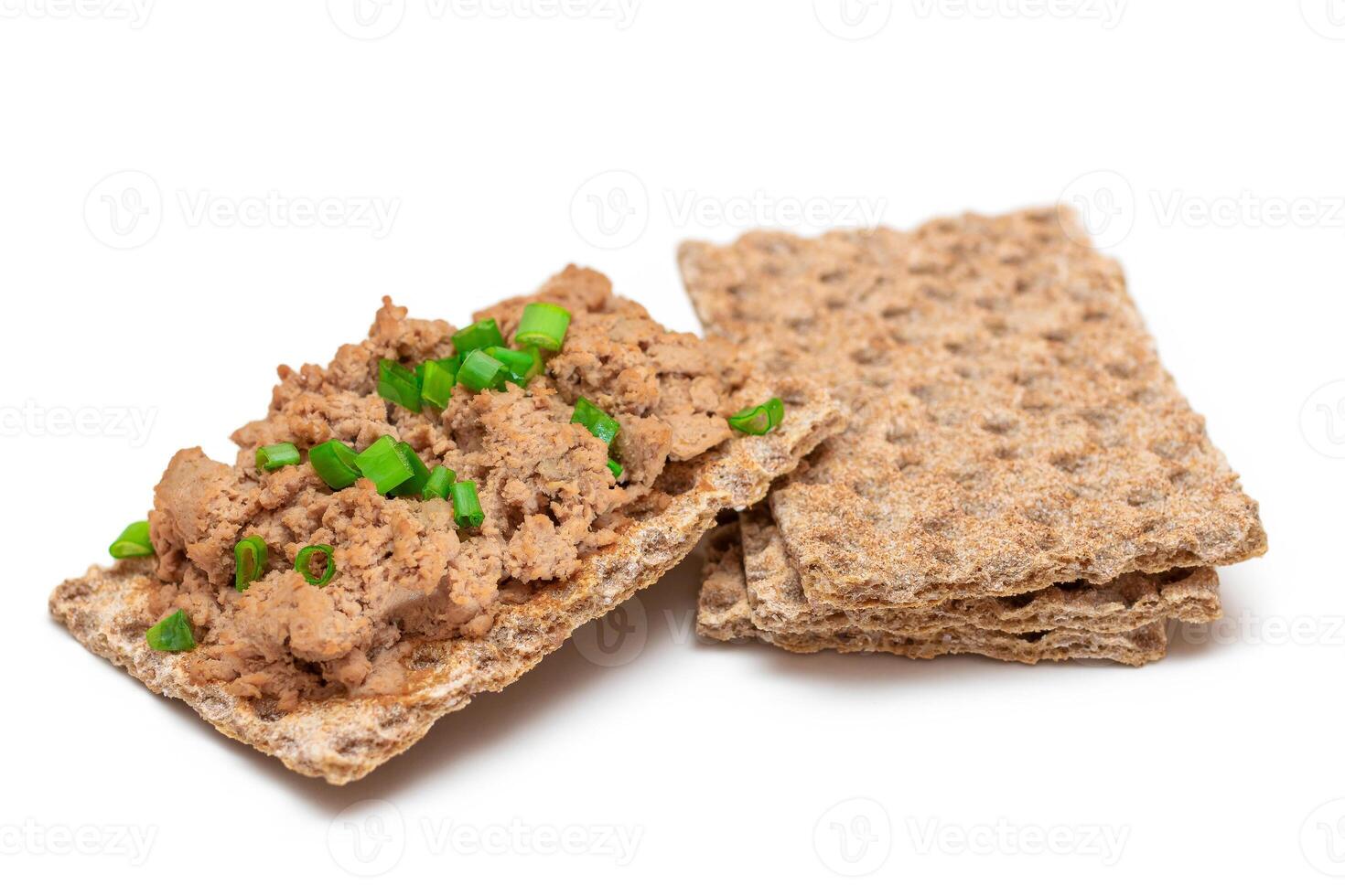Crispy Sandwich with Chicken Pate and Green Onions Isolated on White Background - Top View. Whole Grain Bread with Liver Pate. Diet Breakfast and Healthy Food photo