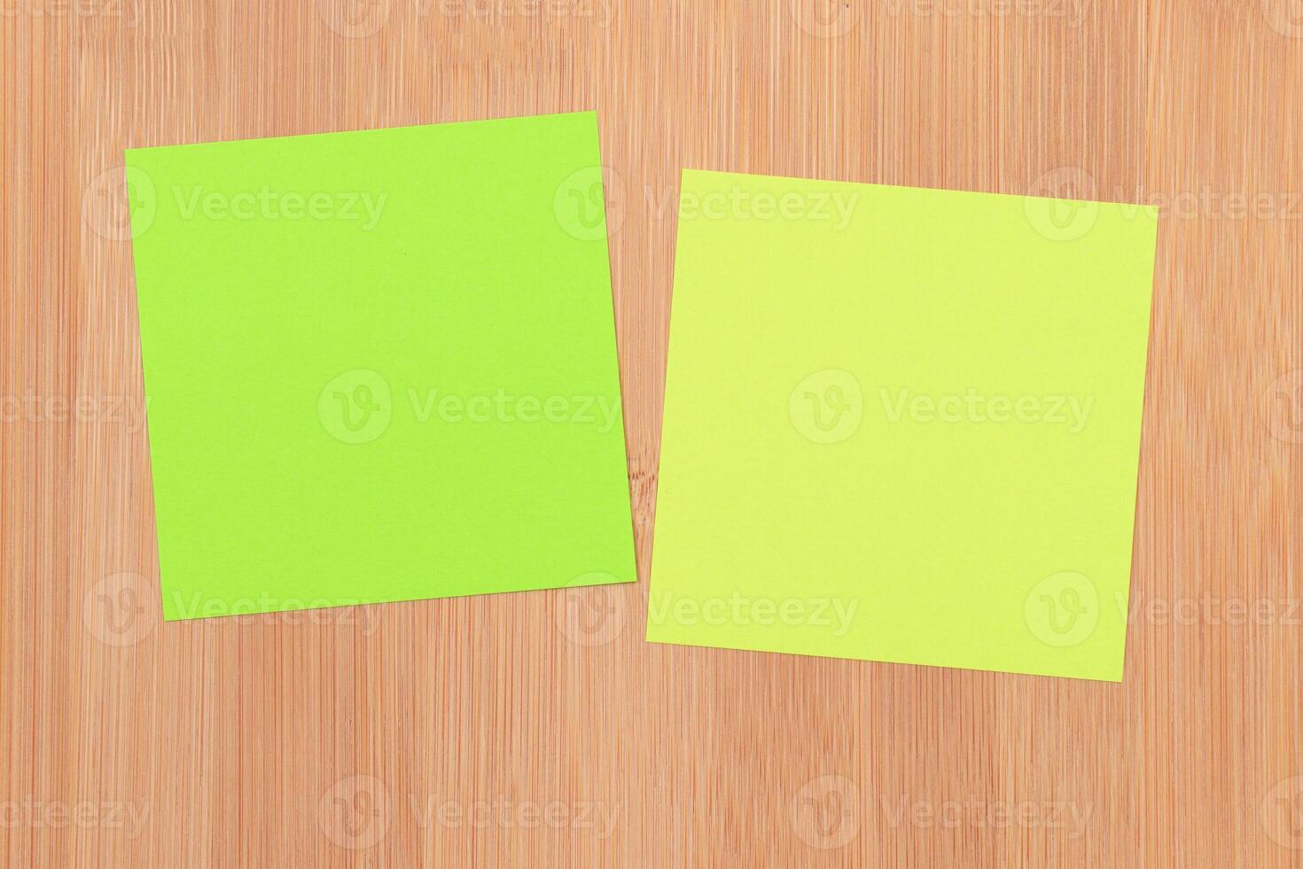 Colored Sticky Notes with Copyspace Pinned to the Wooden Message Board. To Do List Reminder in Office. Blank Memo Sticker at Work - Template. Empty Checklist - Mockup photo