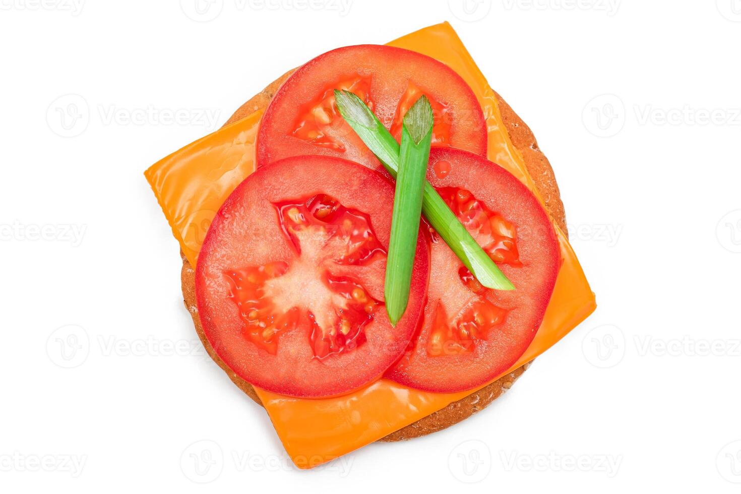 Crispy Cracker Sandwich with Tomato, Cheese and Green Onions - Isolated on White. Easy Breakfast. Quick and Healthy Sandwiches. Crispbread with Tasty Filling. Healthy Dietary Snack - Isolation photo