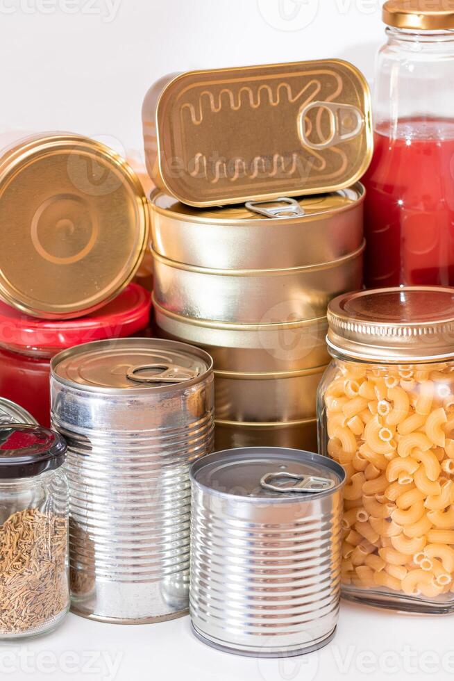 Food Reserves. Canned Food, Spaghetti, Pate, Tuna, Tomato Juice, Pasta, Fish and Grocery. Emergency Food Storage in Case of Crisis. Strategic Food Supplies photo