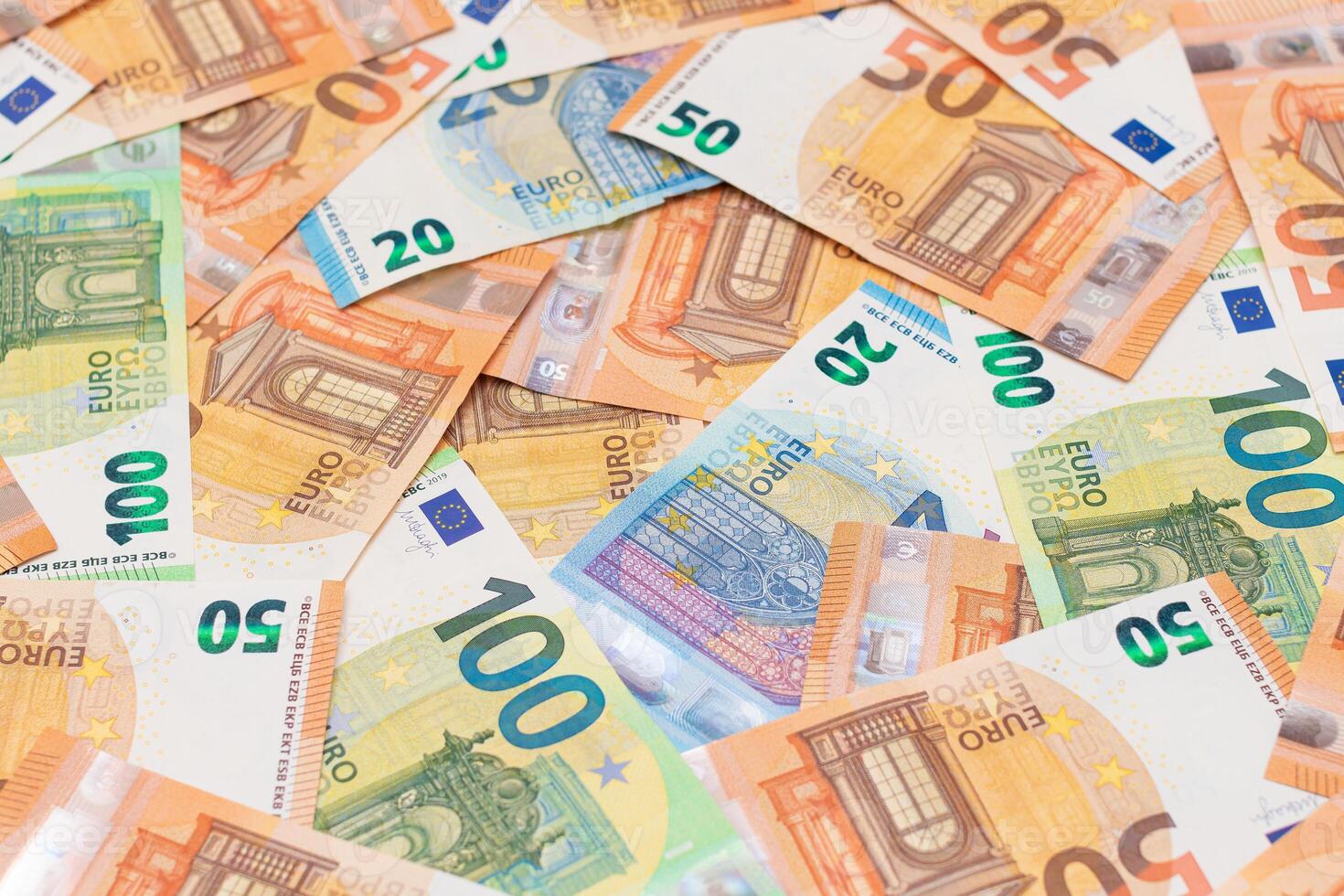 Different Euro Banknotes Money Background. Euro Money Currency. Colored Paper Money. A Lot of Fifty Euro Bills. Business, Finances, Cash and Money Saving Concept photo