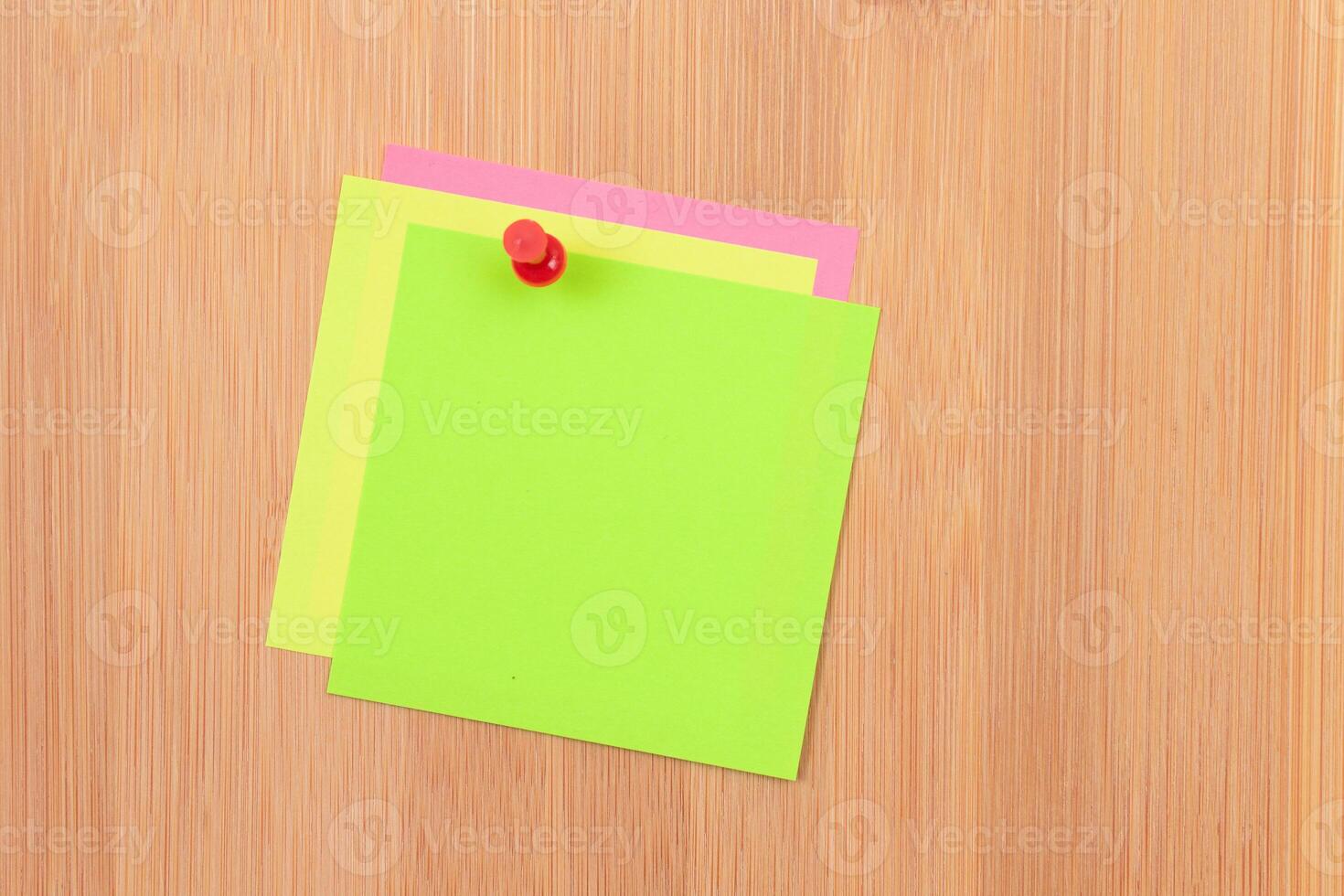 Colored Sticky Notes with Copyspace Pinned to the Wooden Message Board. To Do List Reminder in Office. Blank Memo Sticker at Work - Template. Empty Checklist - Mockup photo