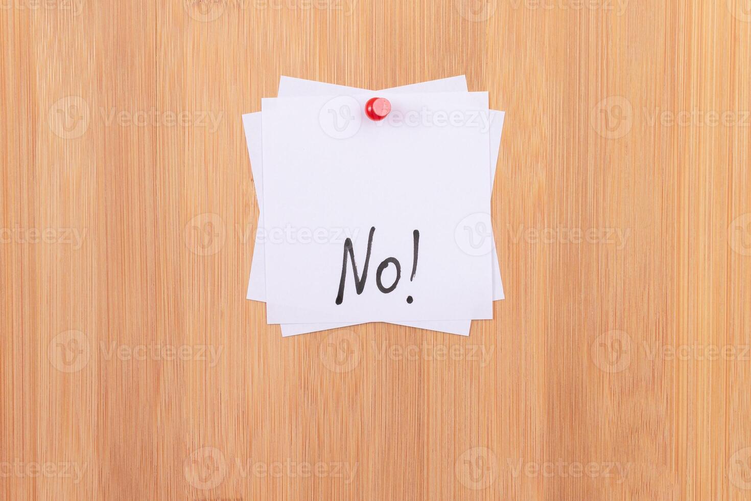 NO - White Sticky Notes with Written Word NO, Pinned to the Wooden Message Board. To Do List Reminder in the Office. Memo Note at Work photo