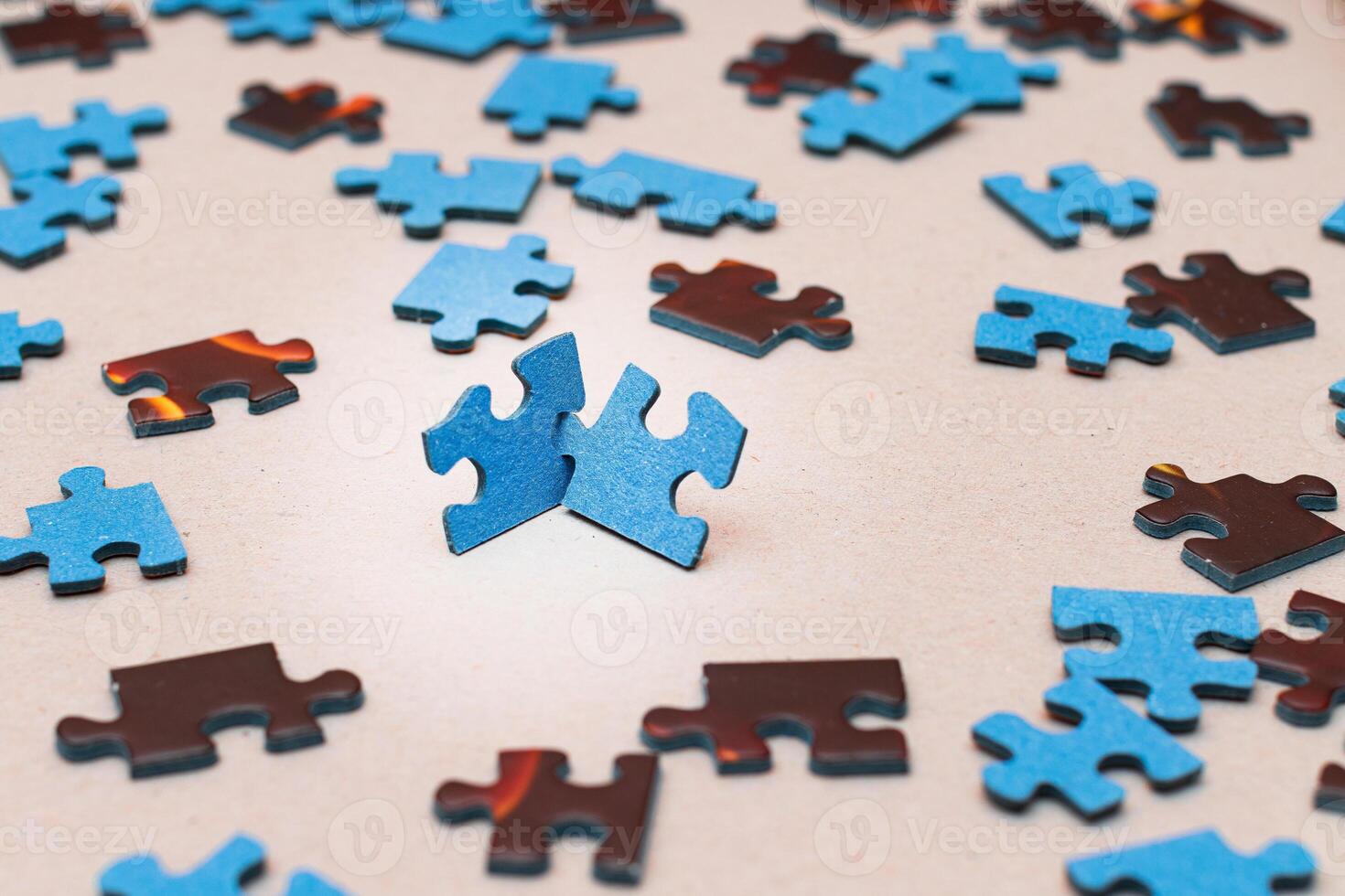 Mixed Pieces of a Colorful Jigsaw Puzzle - Strategy and Solving Problem Concept photo
