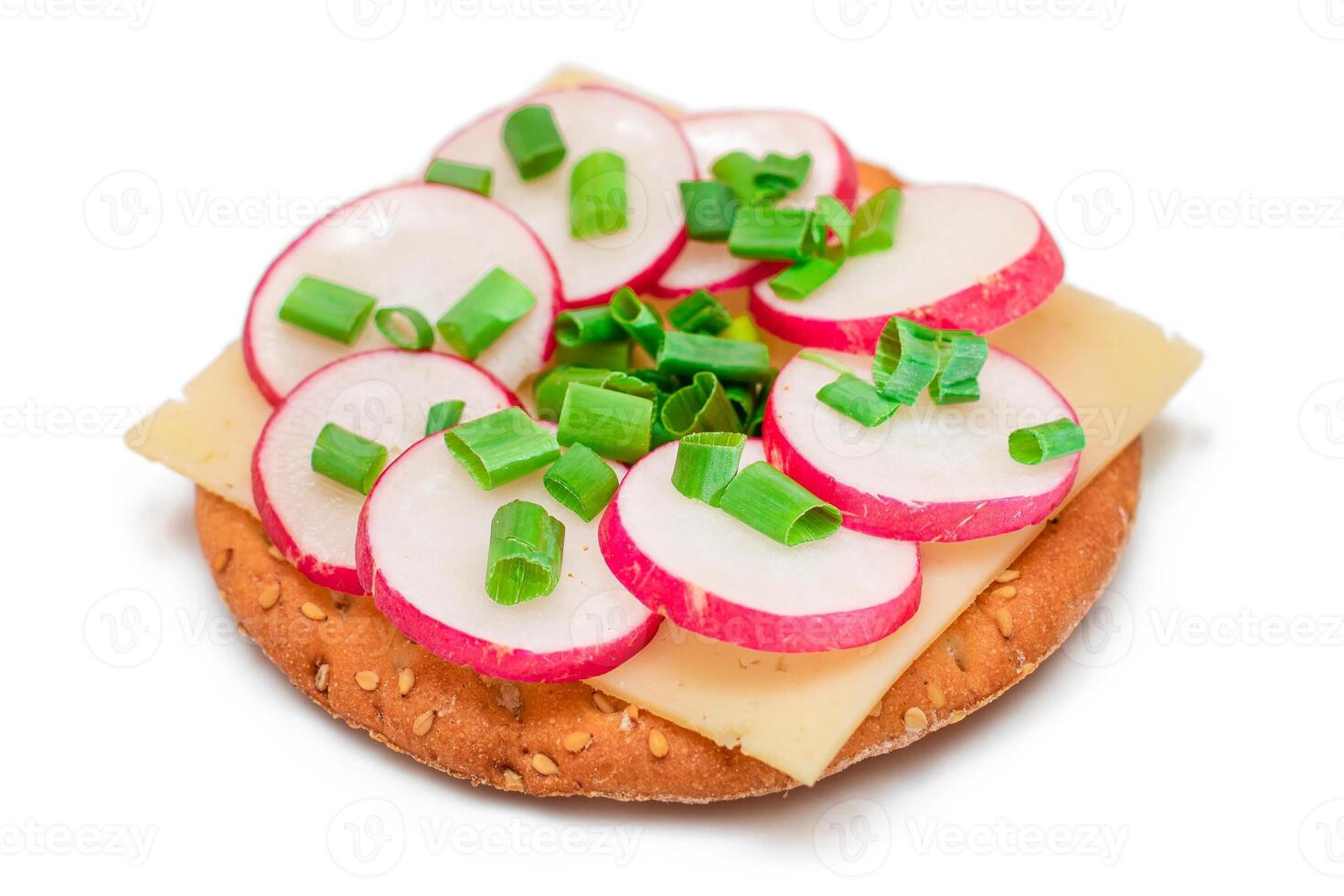 Crispy Cracker Sandwich with Radish, Cheese and Green Onions - Isolated on White. Easy Breakfast. Quick and Healthy Sandwiches. Crispbread with Tasty Filling. Healthy Dietary Snack - Isolation photo