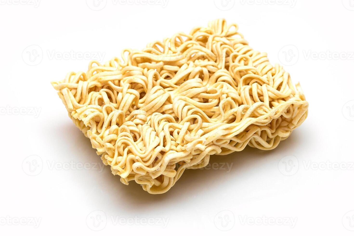Uncooked Instant Noodles on White Plate. Raw Pasta. Dry Asian Fast Food. Quick Lunch photo