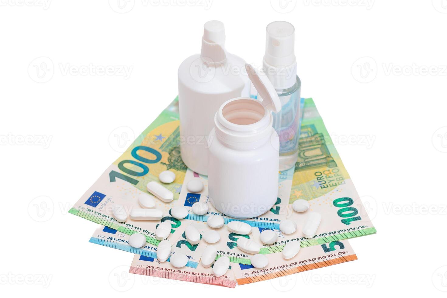 Different Bottles with Pills, Capsules and Medicines on the Euro Banknotes - Isolated on White. Global Pharmaceutical Industry and Big Pharma. Euro Money Bills - Isolation photo