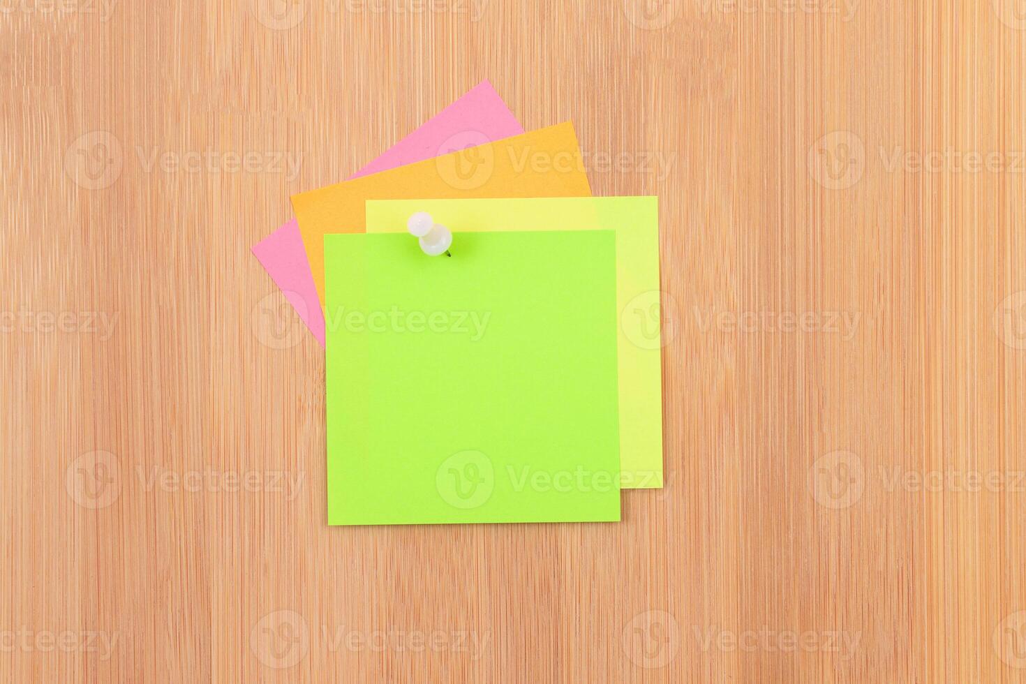 Colored Sticky Notes with Copyspace Pinned to the Wooden Message Board. To Do List Reminder in Office. Blank Memo Sticker at Work - Template. Empty Checklist - Mockup photo