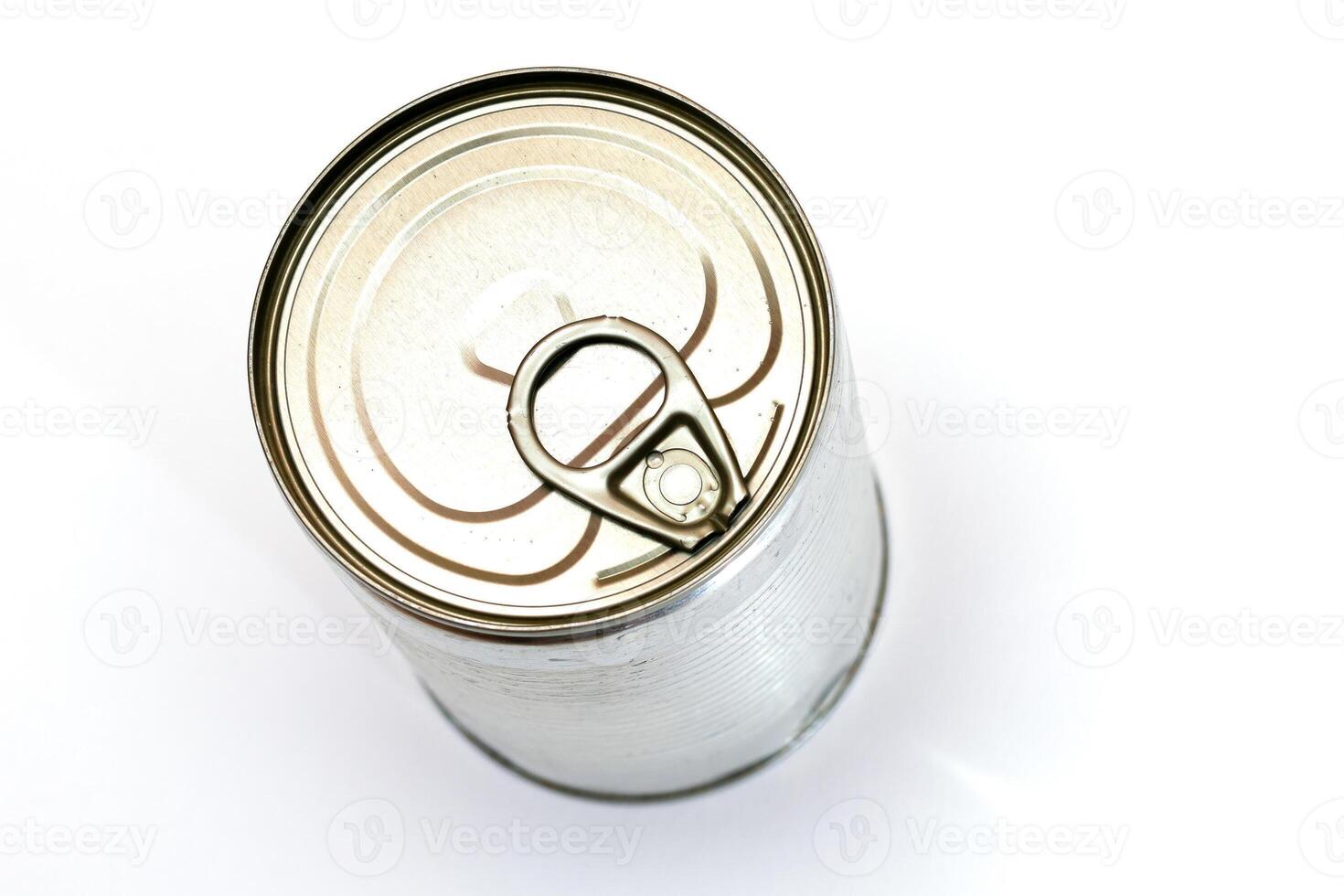 Unopened Tin Can with Blank Edge on White Background. Canned Food. Aluminum Can for Safe and Long Term Storage of Food. Steel Sealed Food Storage Container photo