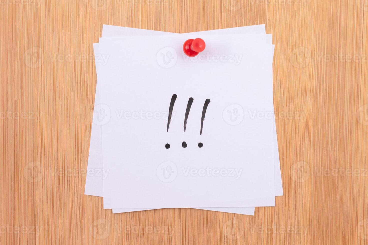 White Sticky Notes with Three Exclamation Points Pinned to the Wooden Message Board. To Do List Reminder in the Office. Memo Note at Work photo