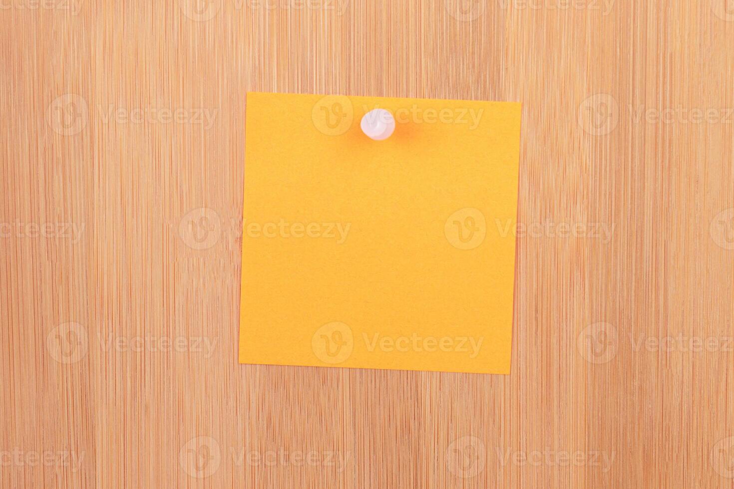 Orange Sticky Note Pinned to the Wooden Message Board. To Do List Reminder in Office. Blank Memo Sticker at Work - Template. Empty Checklist - Mockup photo