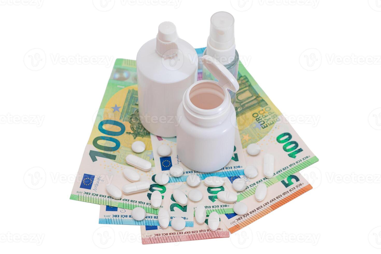 Different Bottles with Pills, Capsules and Medicines on the Euro Banknotes - Isolated on White. Global Pharmaceutical Industry and Big Pharma. Euro Money Bills - Isolation photo