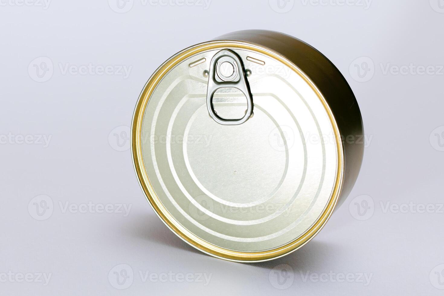 Unopened Tin Can with Blank Edge on White Background. Canned Food. Aluminum Can for Safe and Long Term Storage of Food. Steel Sealed Food Storage Container photo