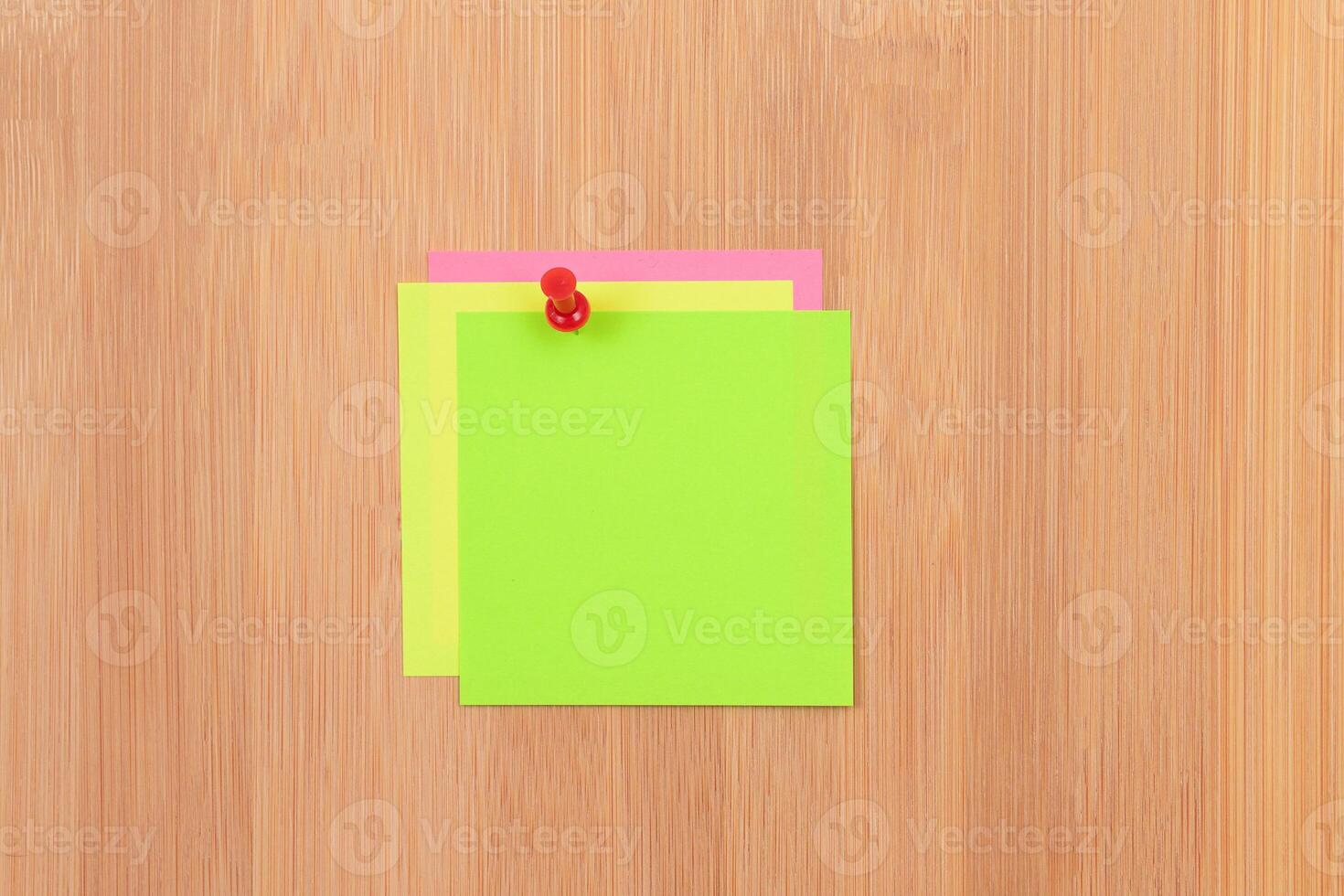 Colored Sticky Notes with Copyspace Pinned to the Wooden Message Board. To Do List Reminder in Office. Blank Memo Sticker at Work - Template. Empty Checklist - Mockup photo