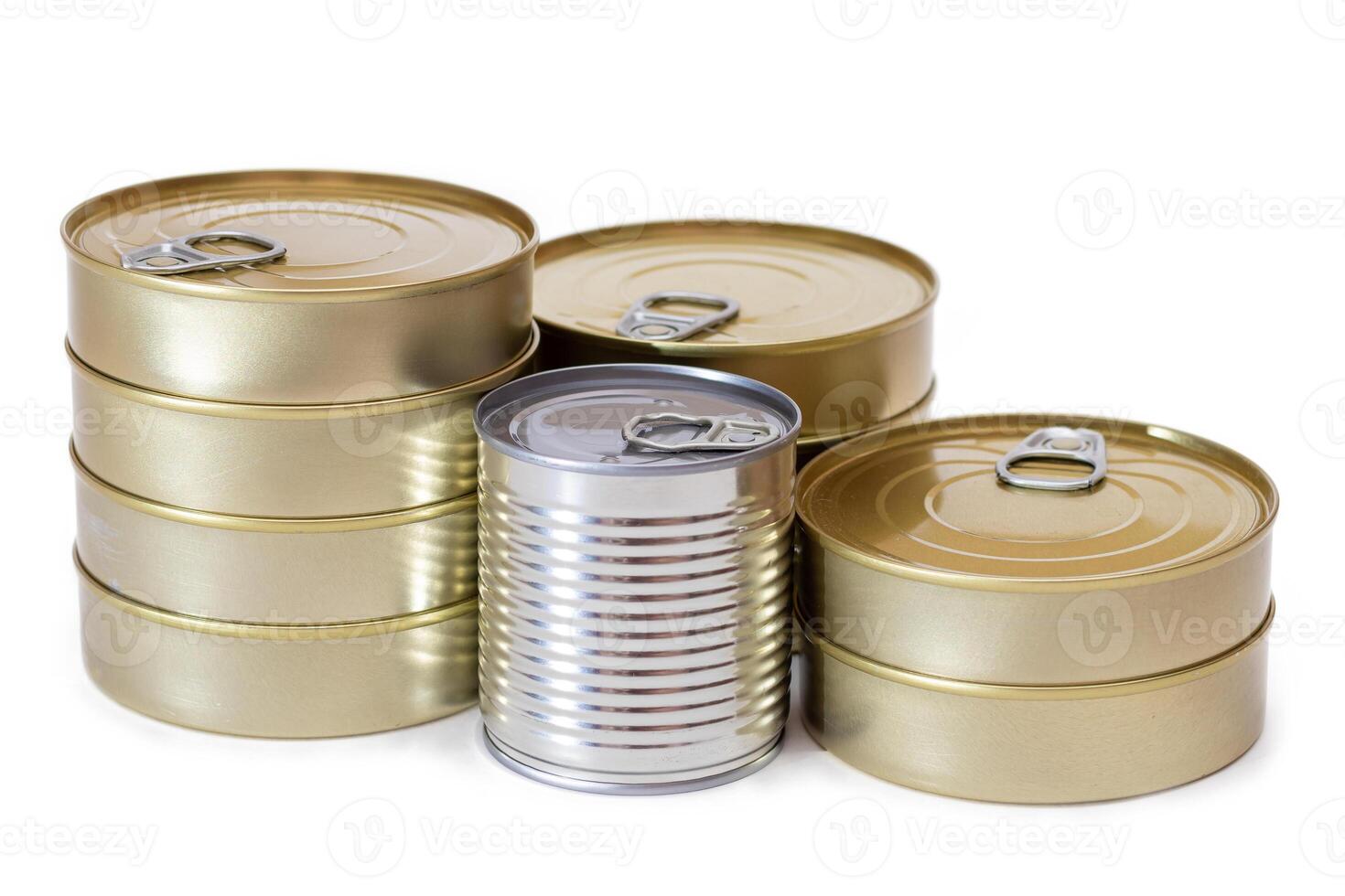 A Group of Stacked Tin Cans with Blank Edges Isolated on White Background. Canned Food. Different Aluminum Cans for Safe and Long Term Storage of Food. Steel Sealed Food Storage Containers - Isolation photo