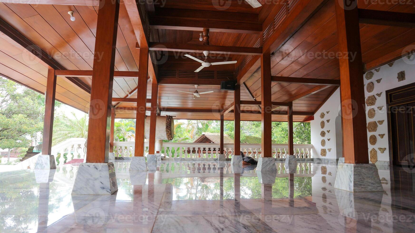 The interior of the Mantingan Mosque, Jepara with a teak wood building with the Joglo concept. photo