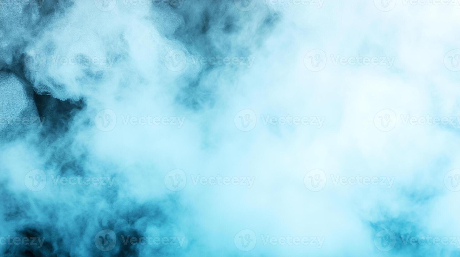 Misty blue smoke fills frame, creating serene and ethereal atmosphere. soft, swirling patterns evoke sense of calm and mystery, perfect for various creative projects photo