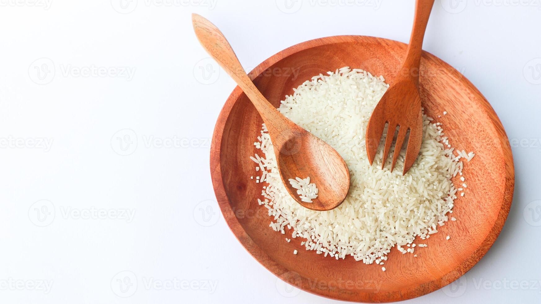 White rice on wooden plates photo