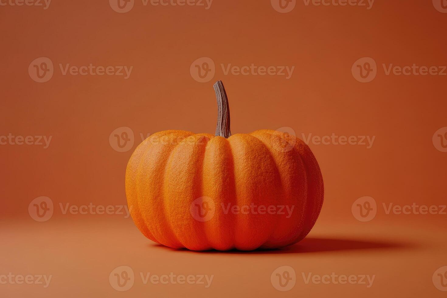 Single Orange Pumpkin on a Solid Orange Background photo