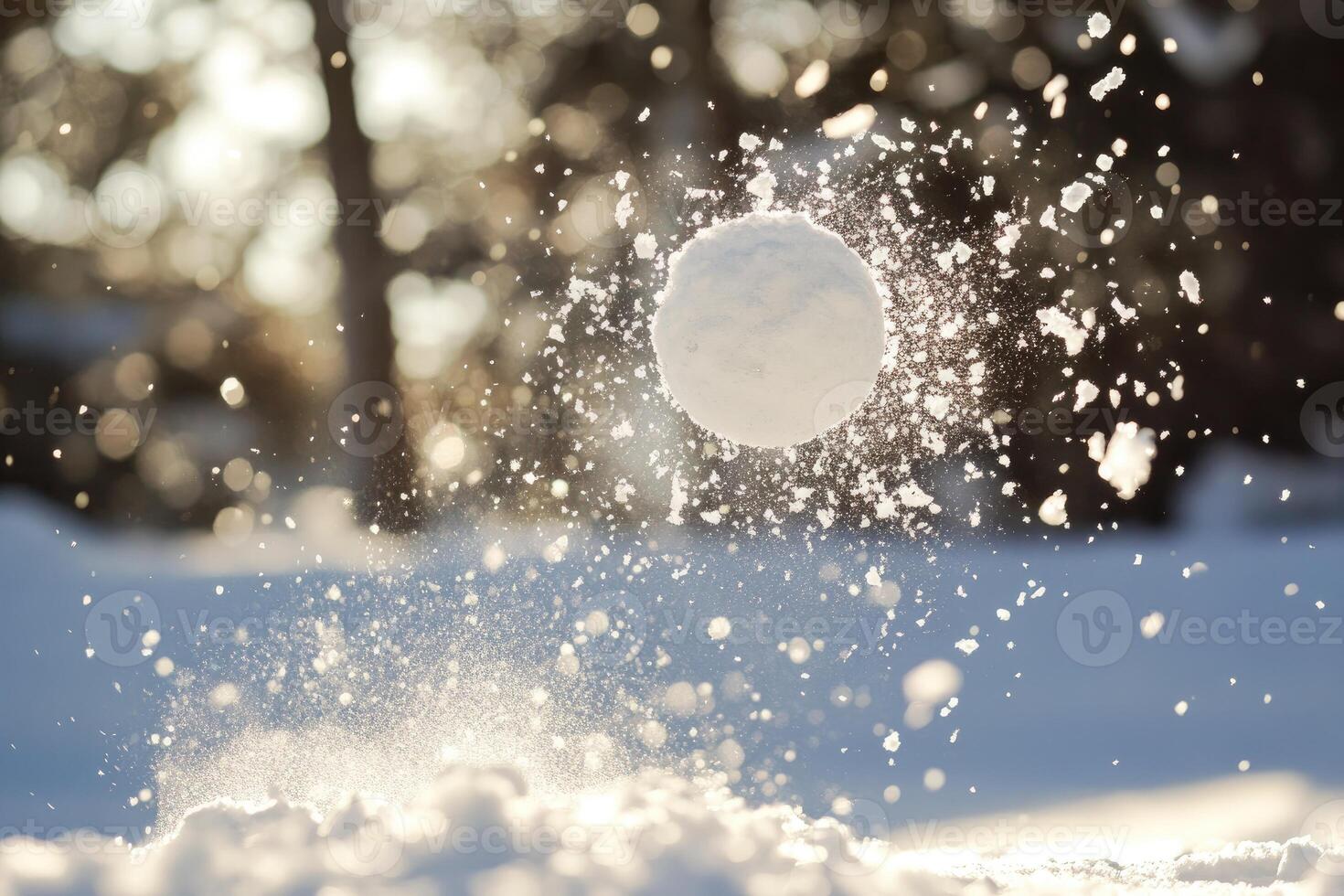 A snowball flying through the air, creating a spray of snow photo