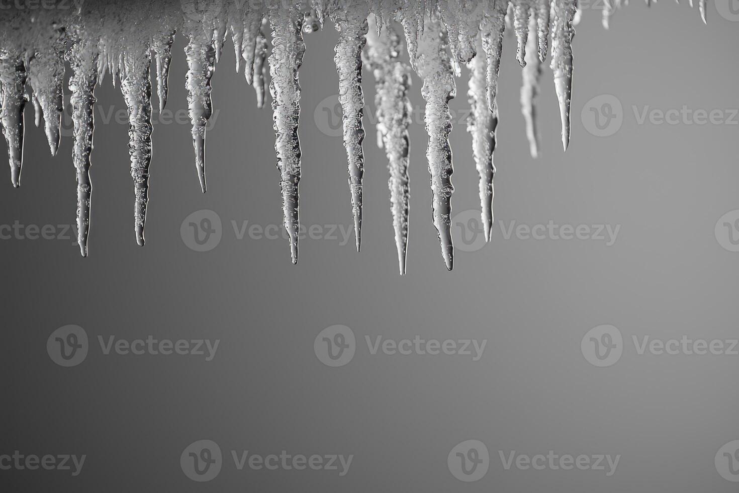 Close-up of Sharp Icicles Hanging from an Eaves photo