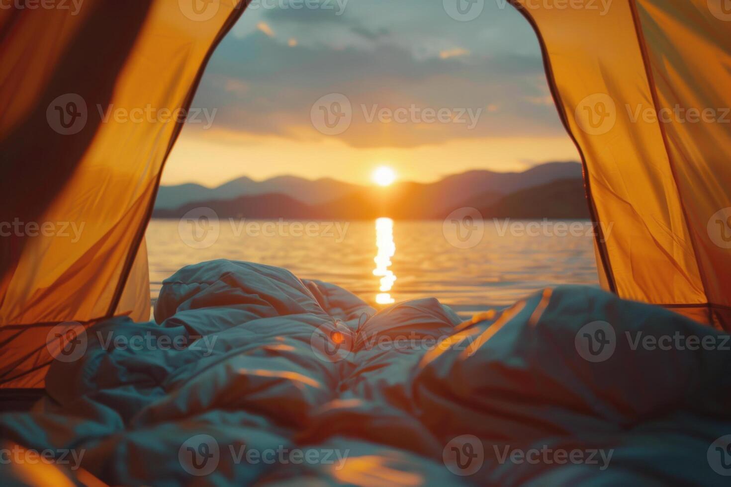 Sunset view over the horizon from the tent, blurred landscape of a lake and mountains on a background. photo