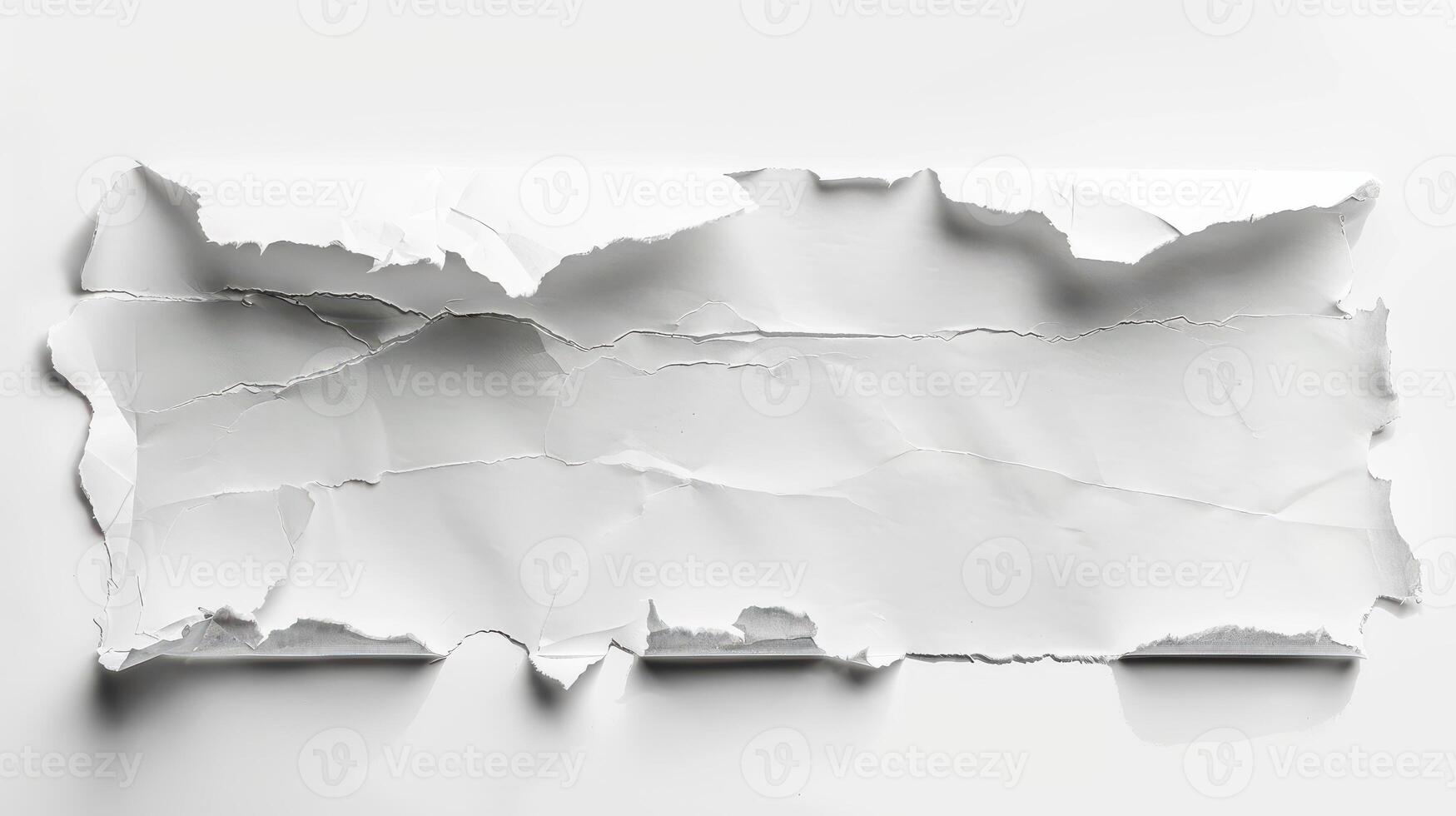 A piece of torn paper on a white background photo