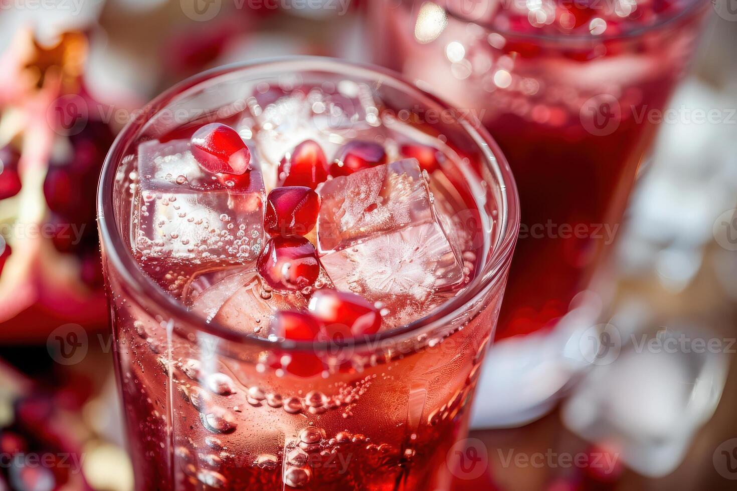 Pomegranate juice with ice and pomegranate photo