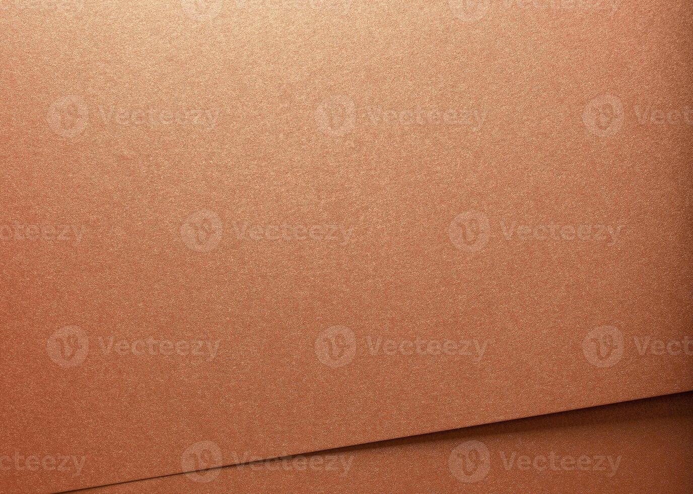 Copper texture with folded material creating an abstract pattern. Decorative designer paper in brown photo